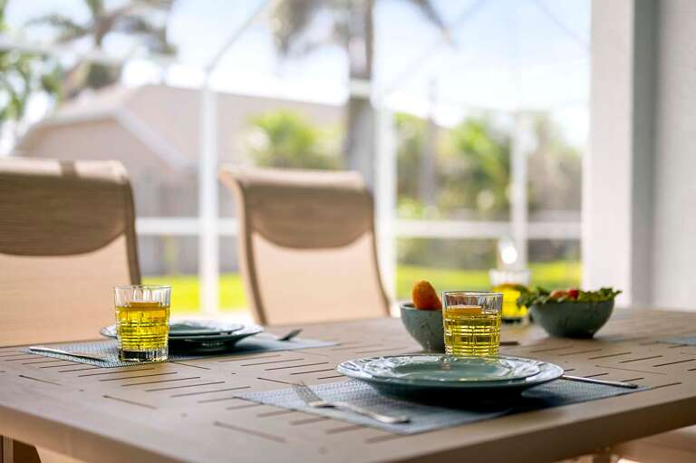 The Outdoor Dining Area Offers Seating for Six
