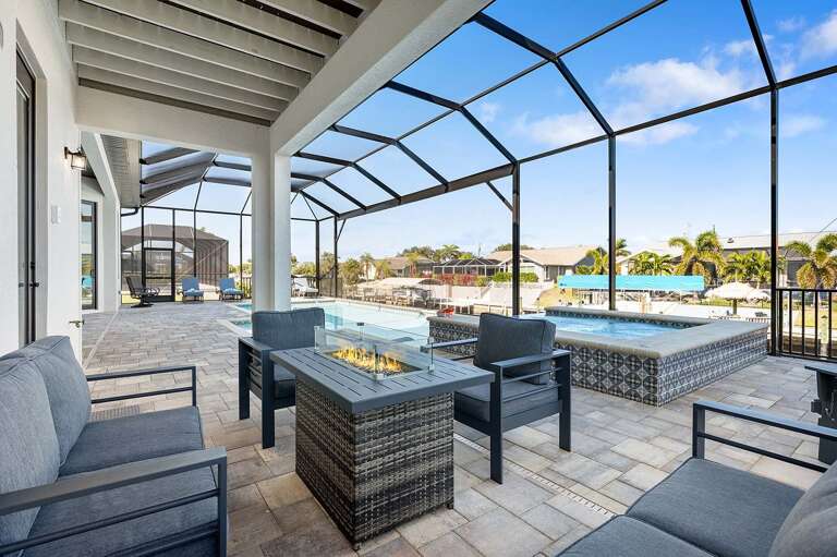Covered Lanai Space to Kick Back and Relax with Gas Fire Table