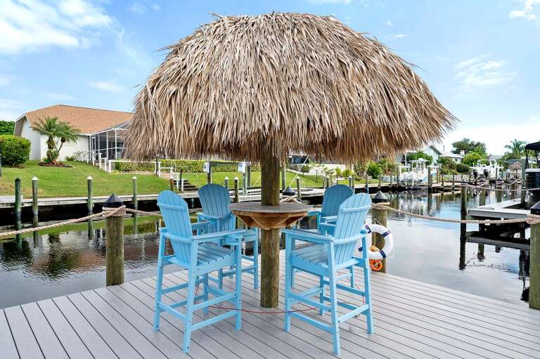 Enjoy an Evening Sundowner on the Dock with Views of the Sunset