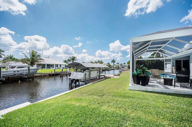 Backyard with Gulf Access Canal
