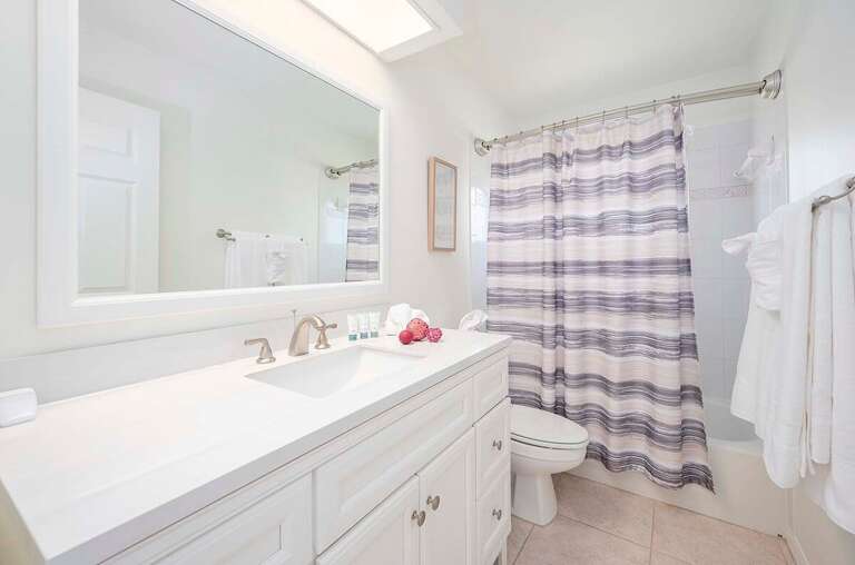 Hallway Bathroom Shared by Bedroom 2 and 3 with Shower Tub Combo