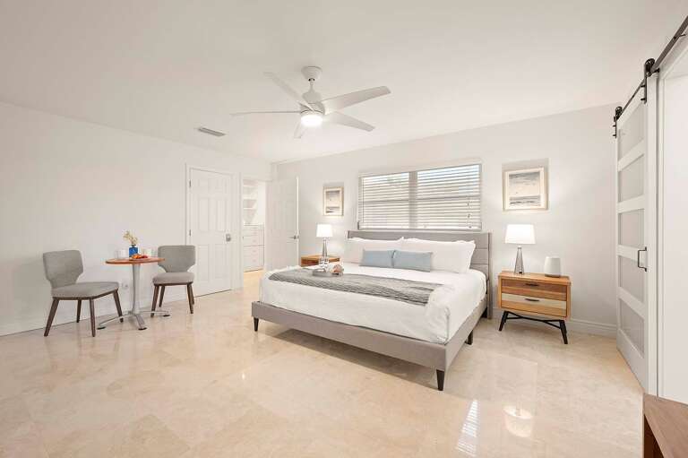 Large King Bedroom Suite with TV and Sitting Area