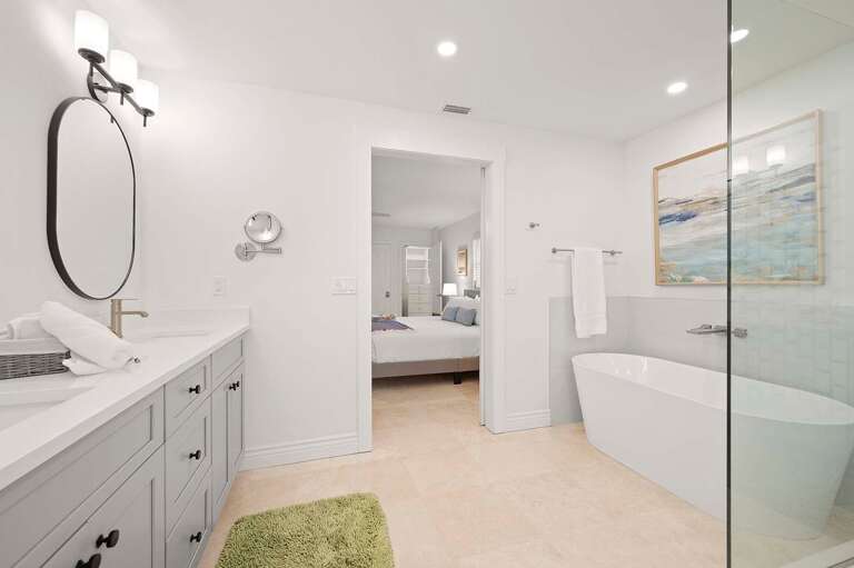Main En-Suite Bathroom Features Garden Tub and Dual Sinks as well as Walk In Shower