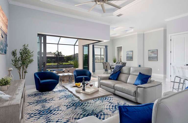 Living Room with Amazing Views of the Pool and Canal