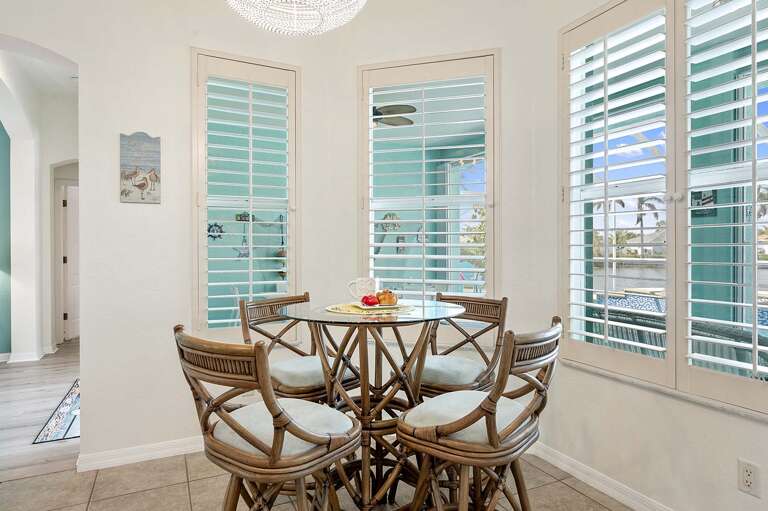 Nook Area with Cozy Seating and Views of the Pool and Lanai