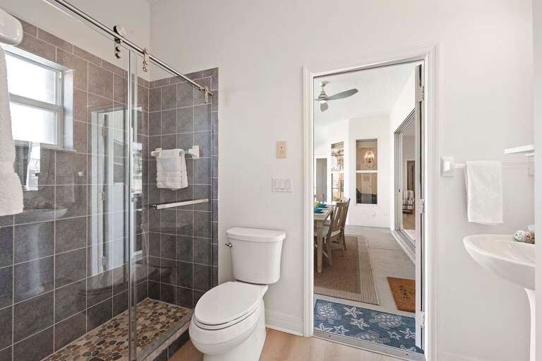 En Suite Bathroom to Queen Bedroom and Pool Bath with Shower and Sink