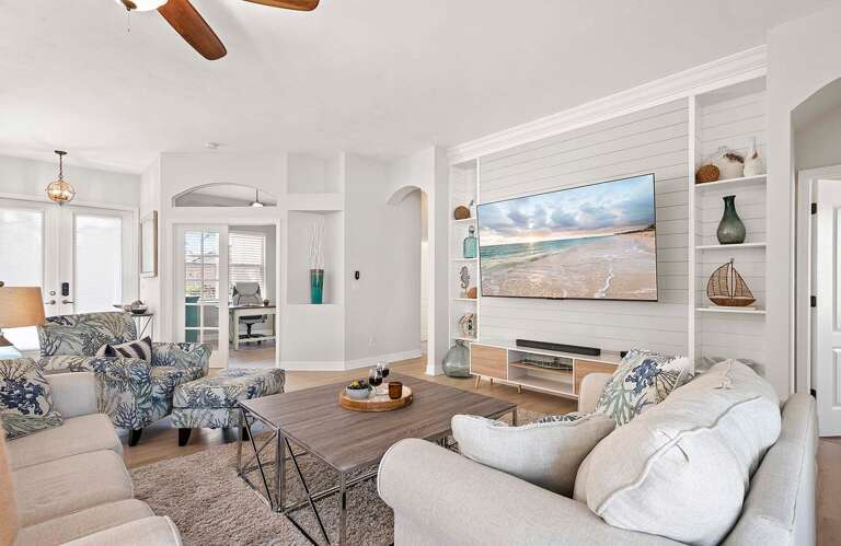 Large Smart TV as well as Comfortable Couches and Chairs are Inviting You to Relax