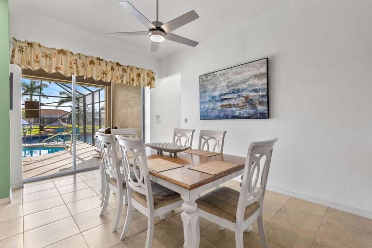 Dining Area with Views of the Pool and Lanai
