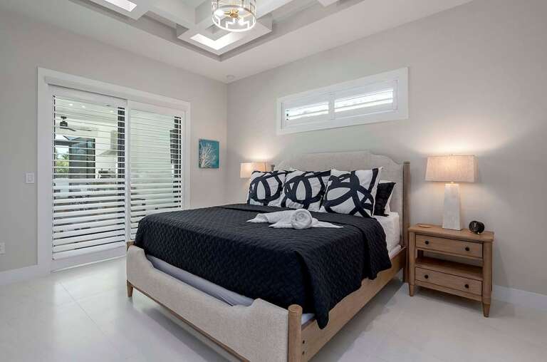 Main Bedroom with Pool Access and King Bed