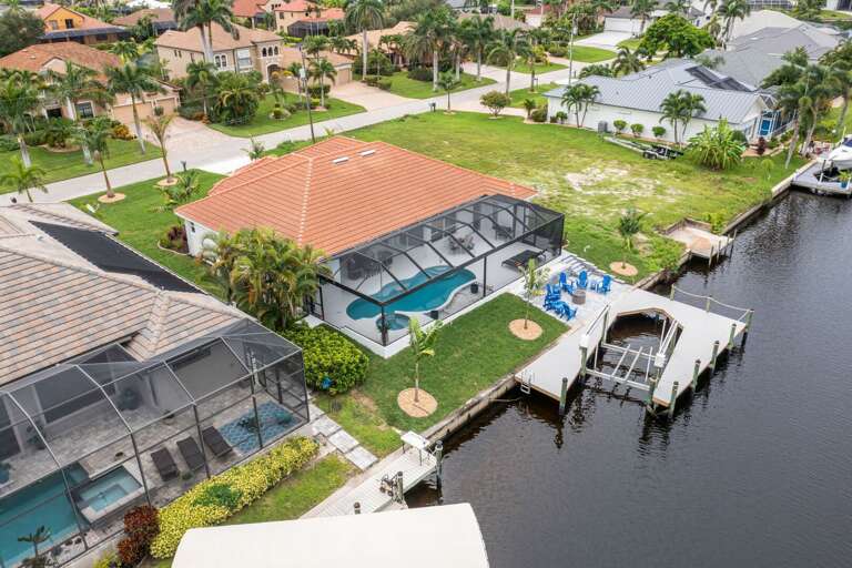 Aerial View of the Gulf Access Villa with Boat Dock and Lift