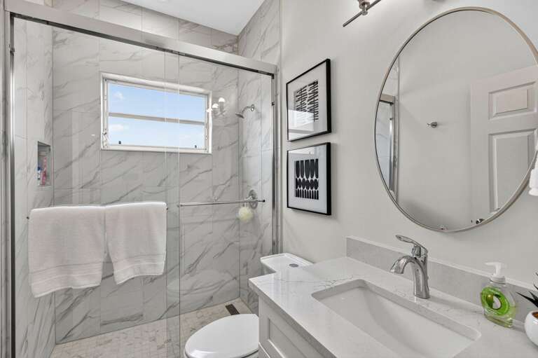 Hallway Bathroom with Shower and Sink