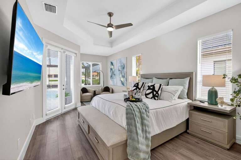 Main King Bedroom Suite with French Doors Accessing the Lanai