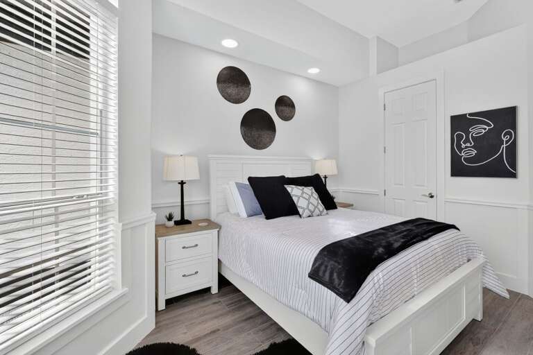 Queen Bedroom Offers TV and Closet