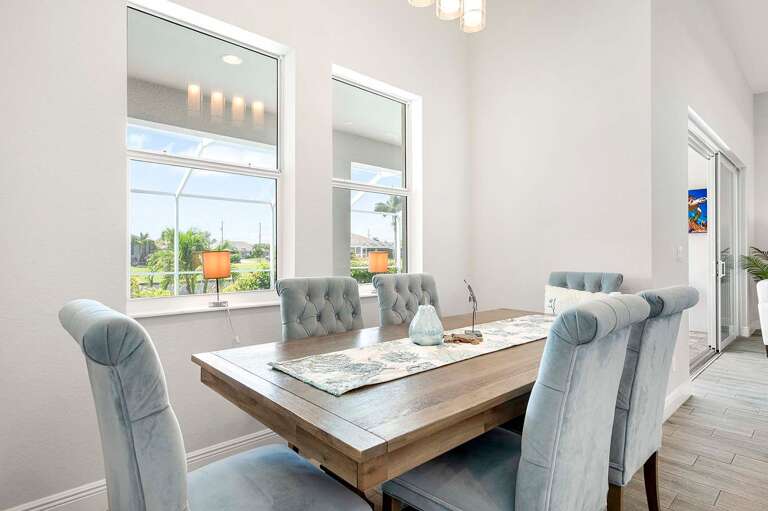 Dining Space with Views of the Pool and Lanai