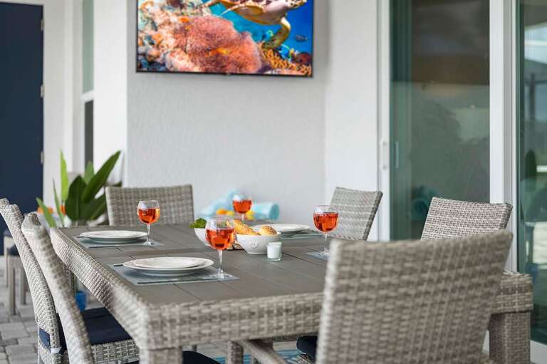 Enjoy Your Meals with Views of the Pool and Canal