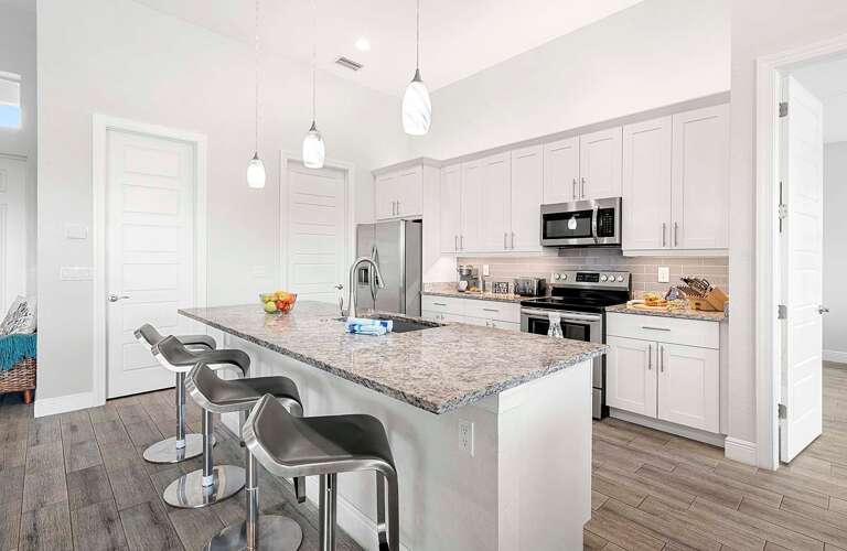 Large Island and Open Kitchen Concept serves as Great Entertainment Space