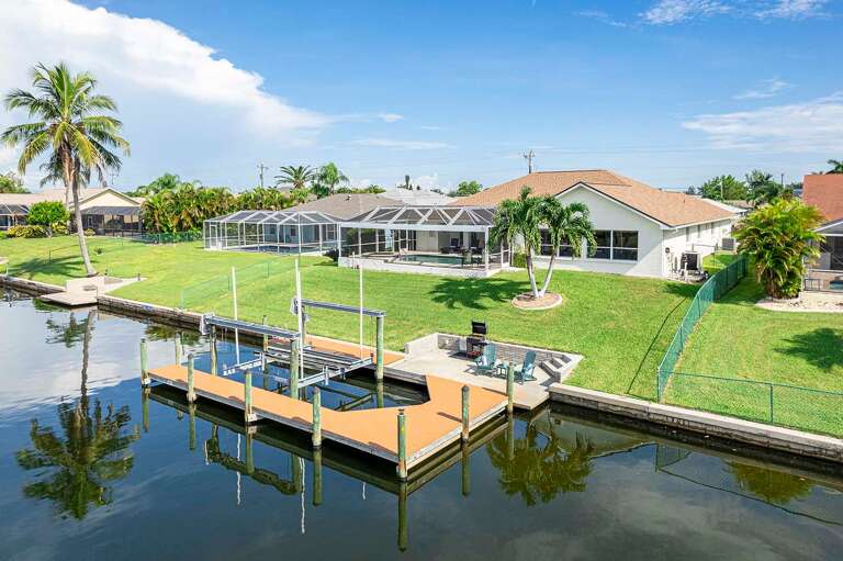 Backyard of Villa Baju with Gulf Access as well as Boat Dock and Lift