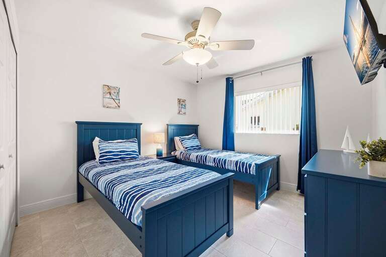 Guest Twin Bedroom with XL Twin Beds and TV
