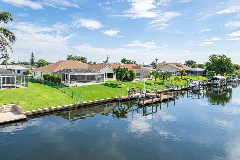 Gulf Access Canal with Boat Dock and Lift