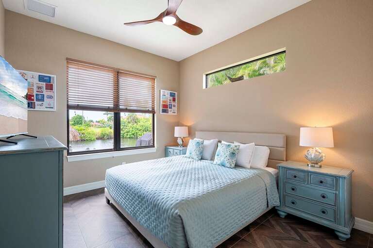 Guest King Bedroom with Views of the Lanai and Canal