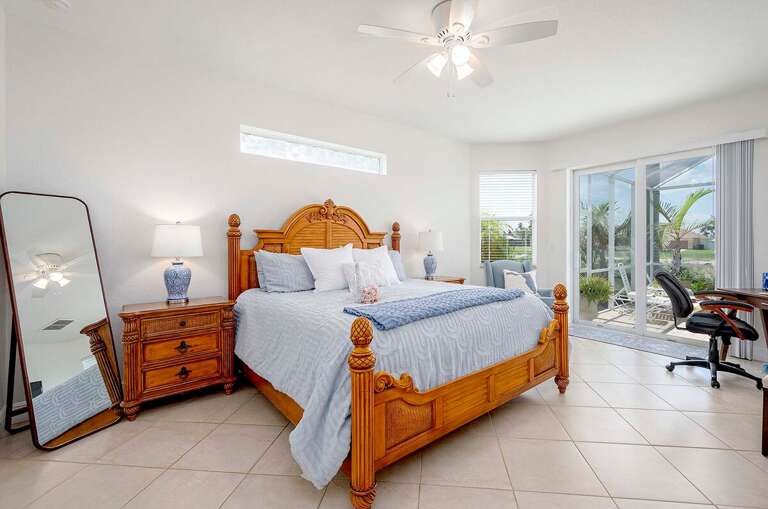 Main Bedroom with King Bed and Pool/Patio Access