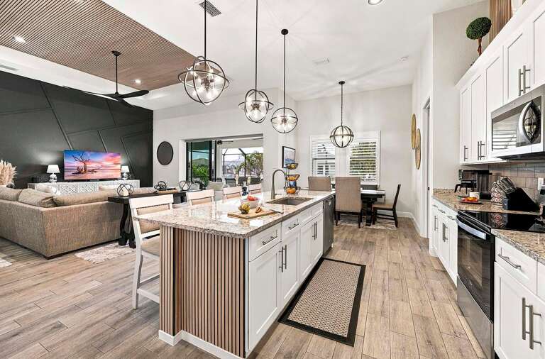 Kitchen is Set Up for Great Entertainment with its Large Kitchen Island Open to the Living Room and Dining Area