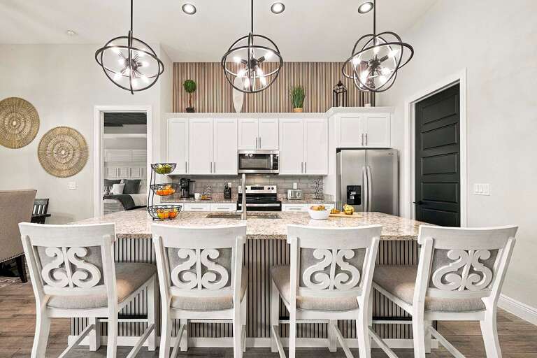 Open Kitchen with Stainless Appliances and Large Kitchen Island