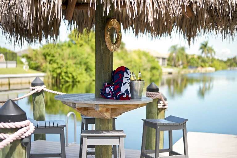 Relax and  Enjoy a Drink under the Tikki Hut