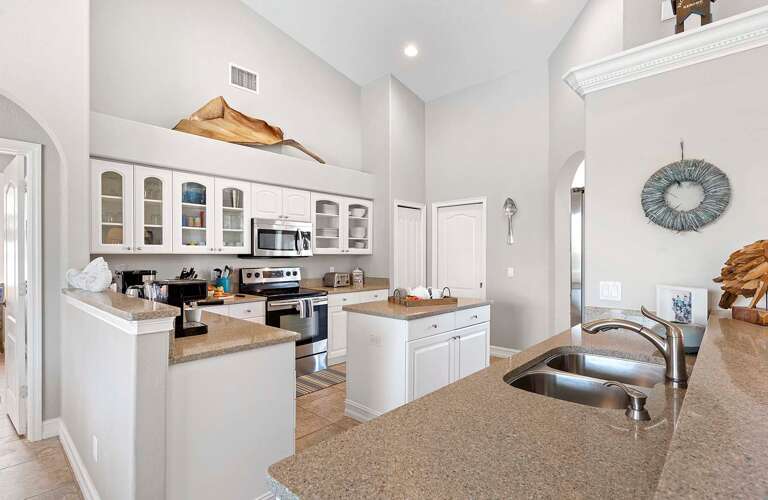 Large Kitchen with Island and Stainless Appliances