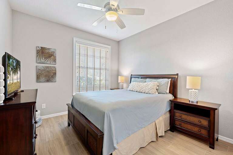 Queen Bedroom with Garden Views and TV