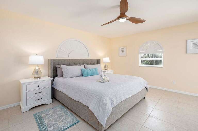 Main Bedroom with King Bed and Access to Patio