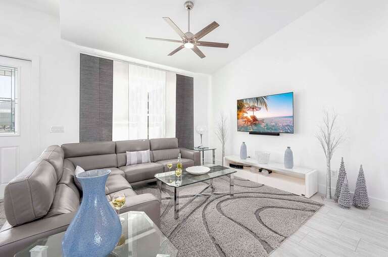 Modern Living Room with Leather Couch and Smart TV