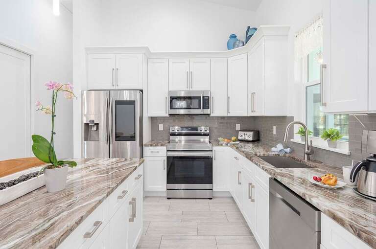 Open Kitchen with Island and Stainless Appliances