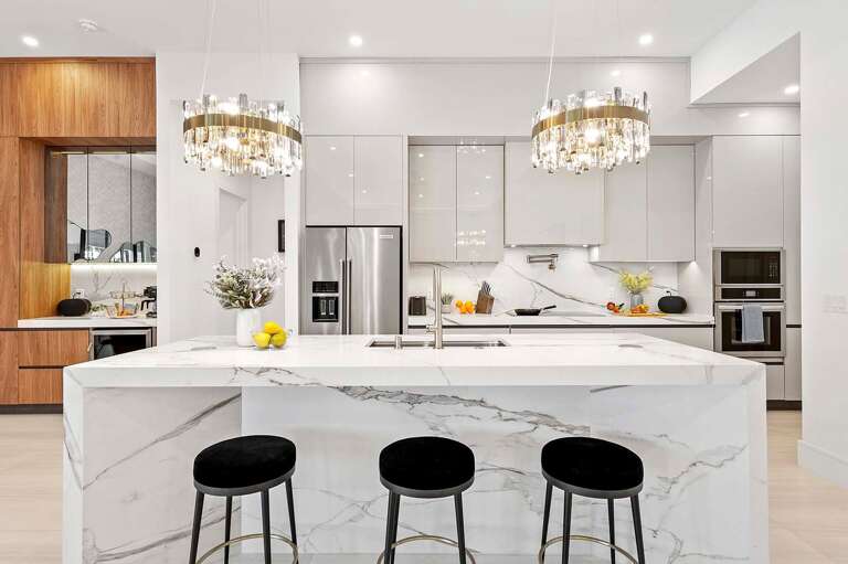 Modern Kitchen with a Top of the Line Appliances and Wine Fridge