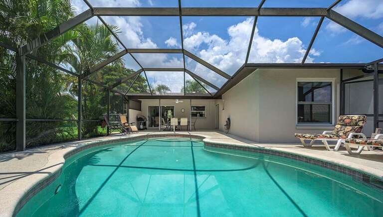 Southern Facing Pool with Lush Landscape