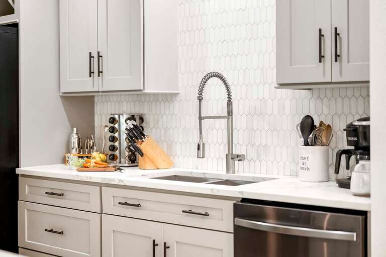 Beautifully Decorated Kitchen with Stainless Appliances