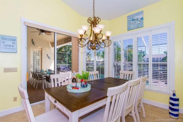Formal Dining with Seating for Eight and Views of the Pool