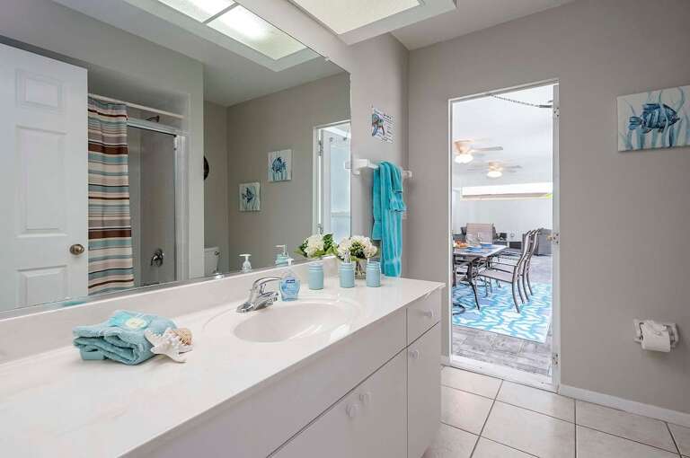 Guest Bathroom as well as Pool Bath with Shower Tub Combo and Sink