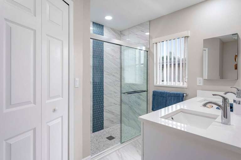 Main Bathroom with Walk in Shower, Walk in Closet and Dual Sinks