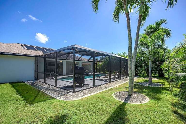 Tropical Palms with Plenty of Privacy Surround Cape Haven