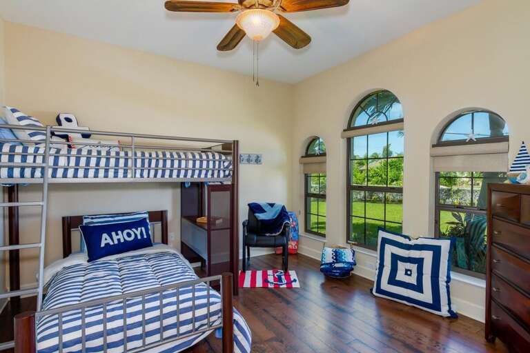 Guest bedroom 3 features a bunk bed and is located to the right of the front entrance