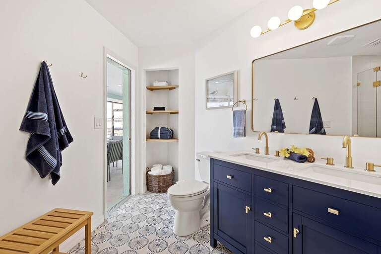 En-Suite Bathroom with Access to the Patio and Double Sinks