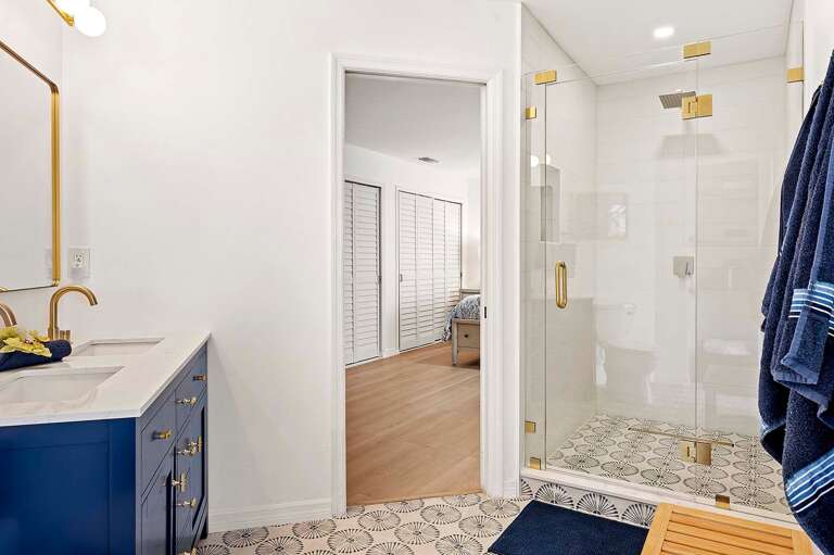 En-Suite Bathroom to Main King Bedroom with Shower and Dual Sinks