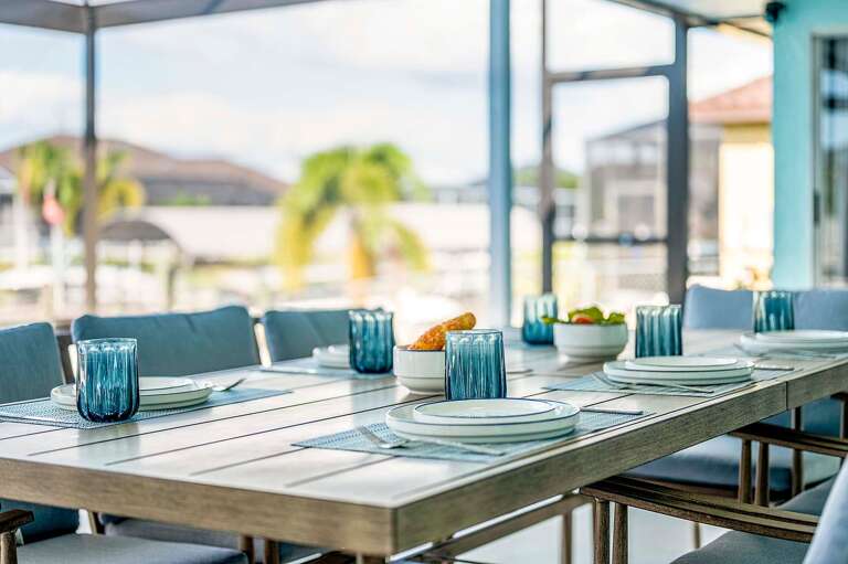 Enjoy Your Meals with Fantastic Views of the Pool and Canal