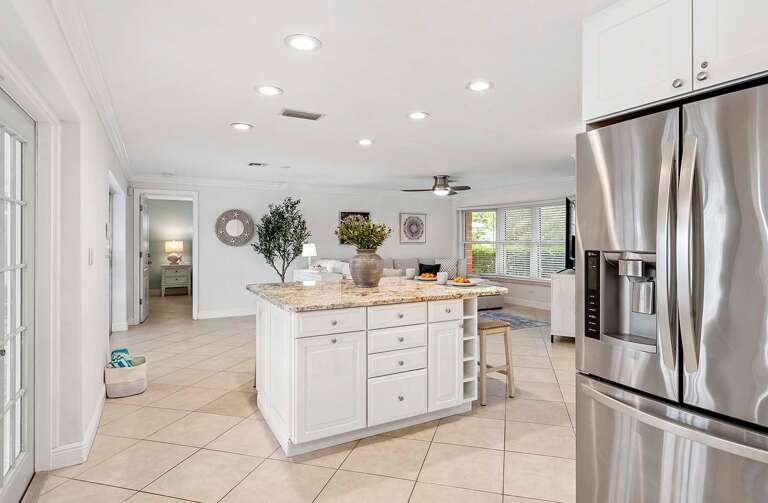 View from the Kitchen to the Island and Living Area