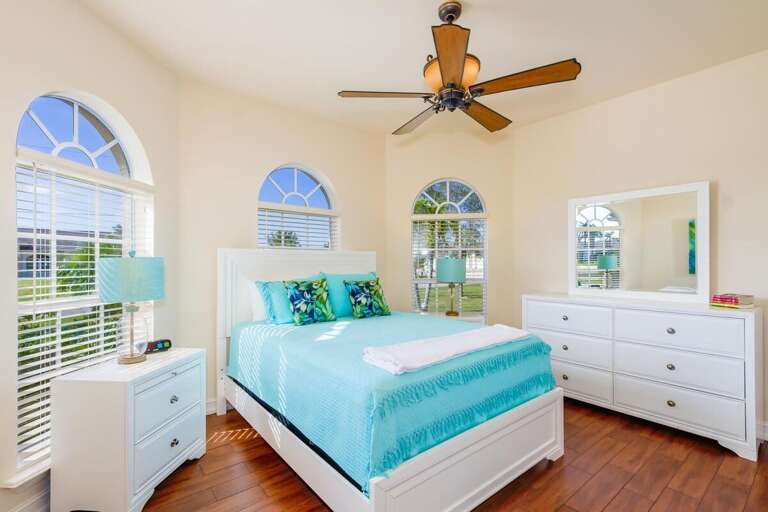 Guest Bedroom with Queen Bed and Garden View