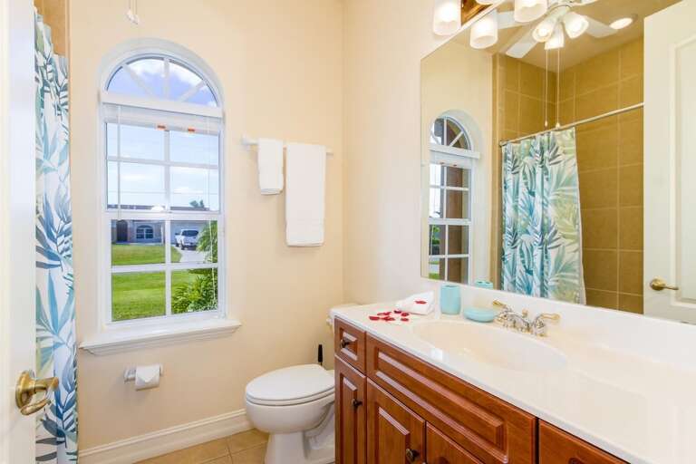 Hallway Bathroom with Shower Tub Combo and Sink