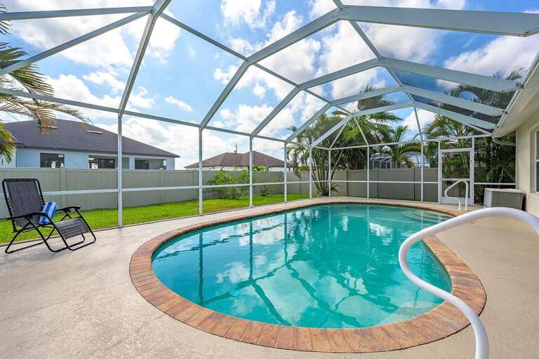 Enjoy this Large Pool with the Privacy Yard and Fence