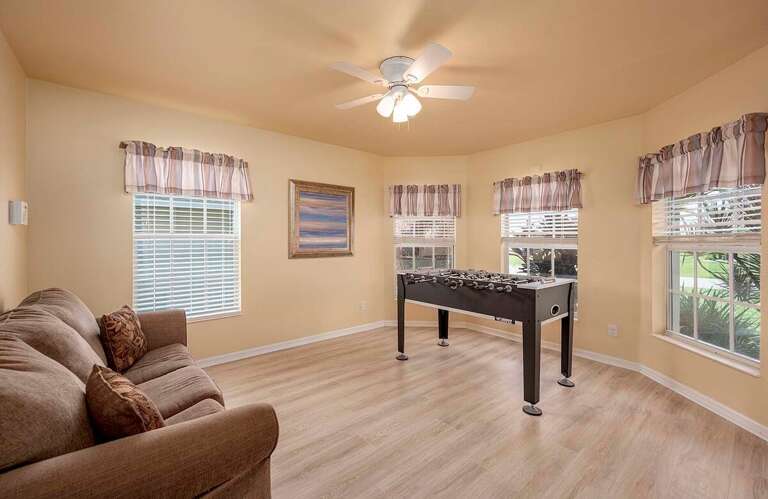 Game Room with Fuzzball Table and Sleeper Couch