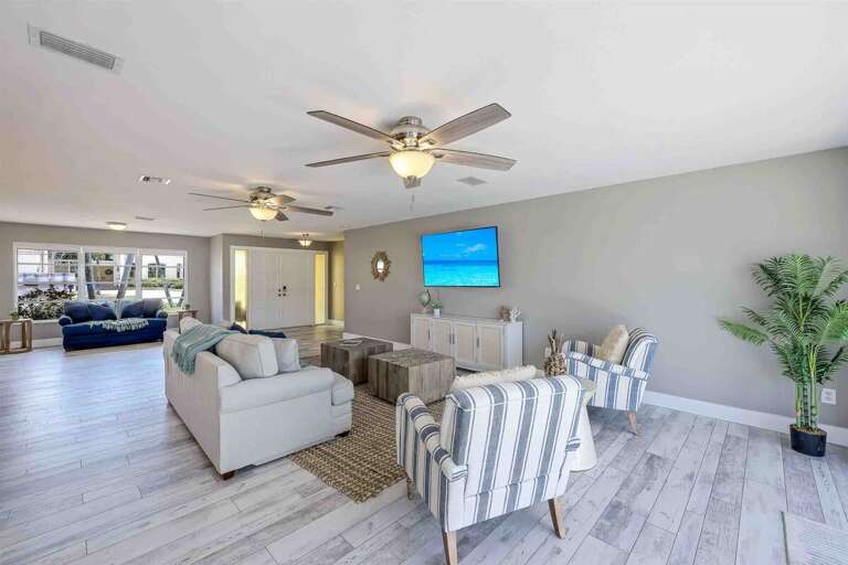 Coastal Living Room Open to Kitchen and Dining Room